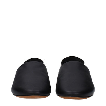 Givenchy Black Leather Slides with round toe and low flat heel, featuring side and back logo in black leather design.