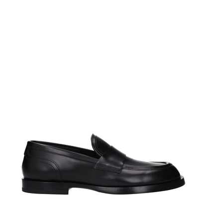 Dolce & Gabbana Black Leather Slip-On Loafers with round toe and leather sole, casual style.