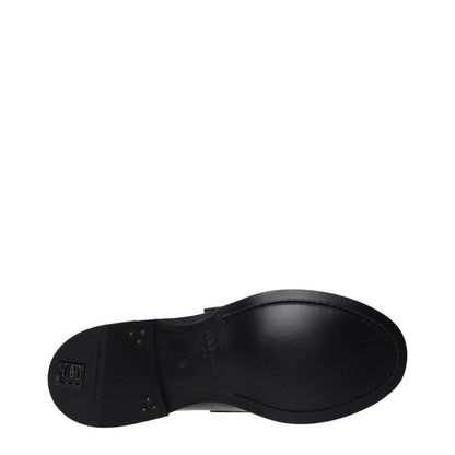 Sole view of Dolce & Gabbana Black Leather Slip-On Loafers with round toe and low flat heel.