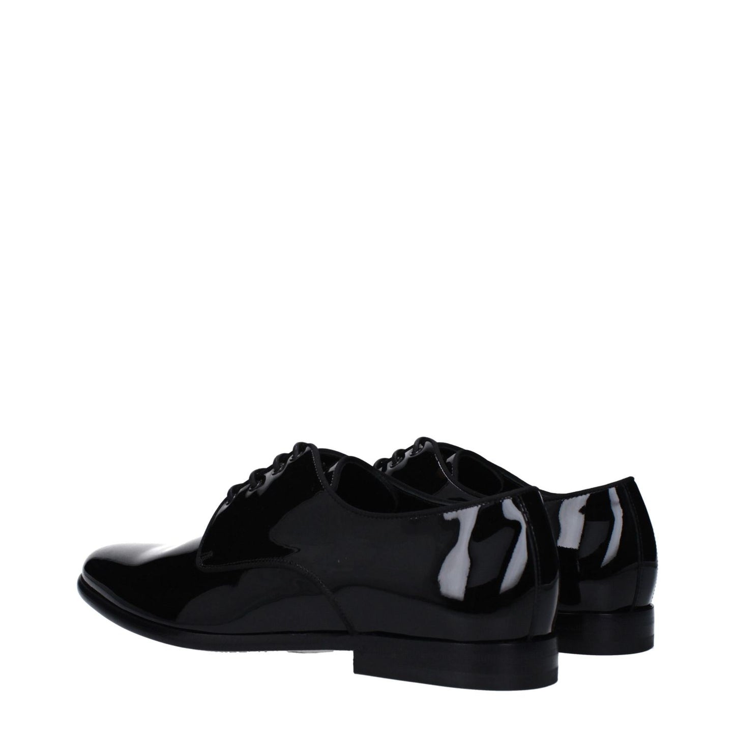 Dolce & Gabbana Black Leather Oxfords And Derbies with lace up design and pointy toe, showcasing patent leather and low flat heel.