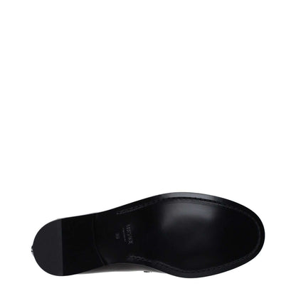 Sole view of Versace Black Leather Slip-On Loafers showing leather sole and low flat heel design.