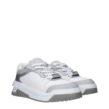 Versace White Leather Chunky Sneakers with lace-up closure, mid heels, and rubber sole, featuring front, side, and back logos in silver.