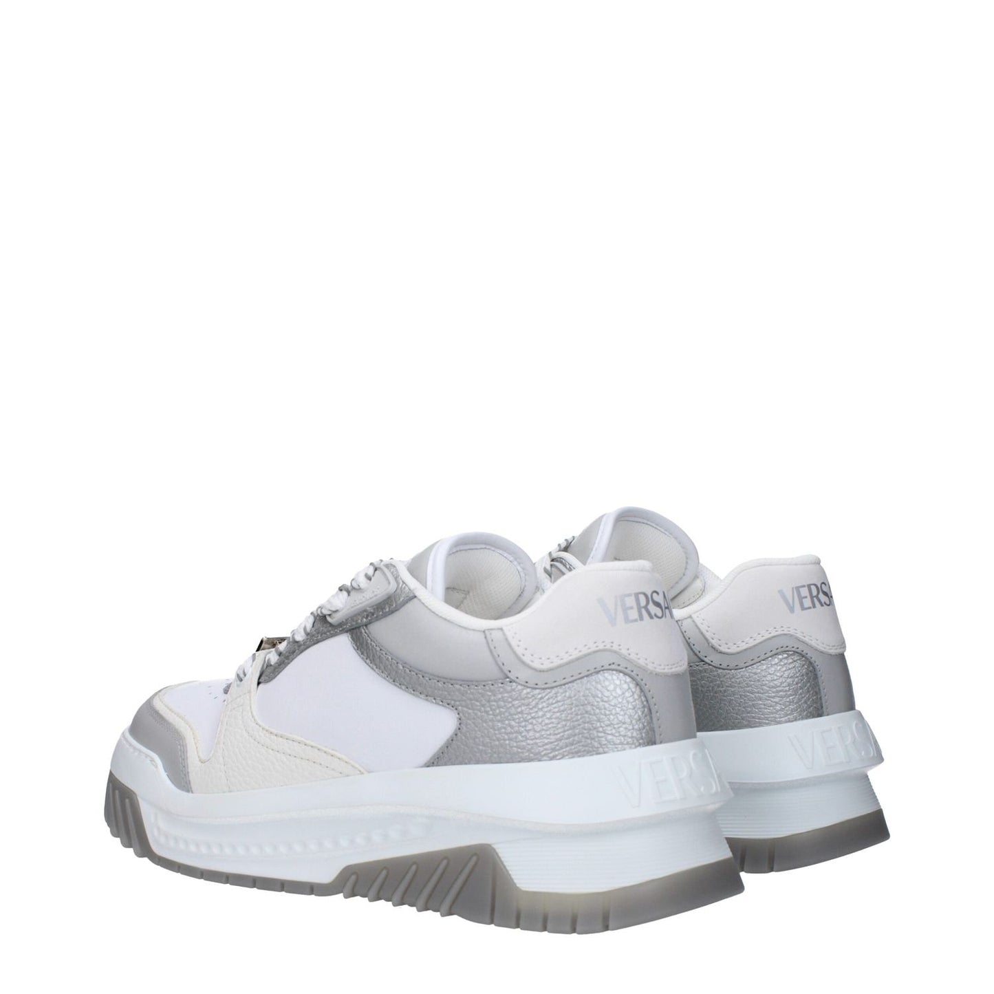 Versace White Leather Chunky Sneakers with logos, lace-up closure, rubber sole, and 5.5 cm mid heels featuring a silver accent.