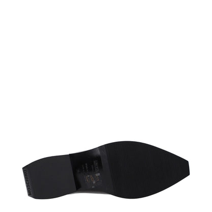 Sole view of Moschino Black Leather Mules with rubber sole and pointy toe.