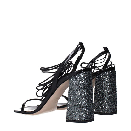 Miu Miu Black Leather Platform Sandals with glitter block heels and strappy design, side view.