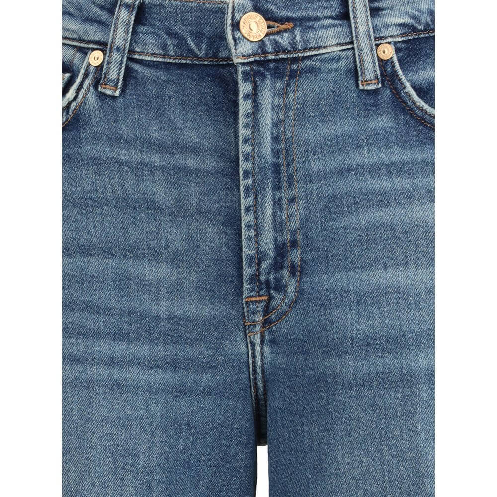 Close-up of 7FOR Blue Cotton Flared Jeans showcasing front zipper and button closure
