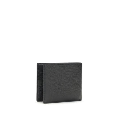 Valentino Garavani Black Calf Leather Bos Taurus Wallet, elegant bifold with VLogo plaque and multiple card slots, AW25 collection.