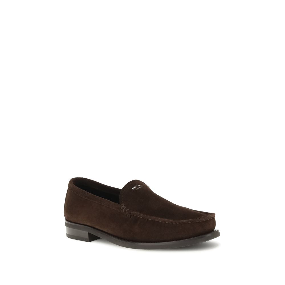 Prada Brown Calf Leather Bos Taurus Slip-On Loafers with suede finish and rubber sole, featuring tapered lightweight design, AW25 collection.