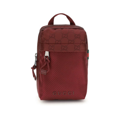 Gucci Bordeaux Polyamide Shoulder Bag with logo, mesh detail, and signature green-red web, featuring interior and exterior pockets for convenience.