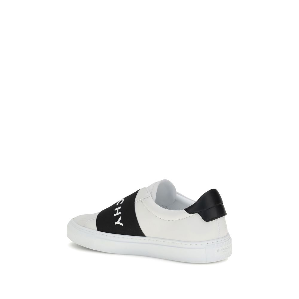 Givenchy White Calf Leather Bos Taurus Low Top Sneakers featuring embossed logo and contrasting elastic band with Givenchy Paris lettering.