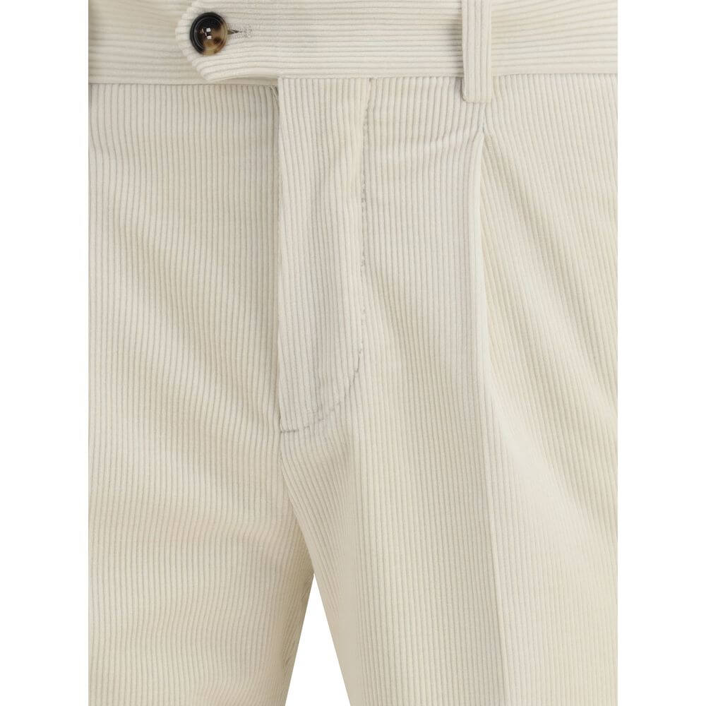 Close-up of Brunello Cucinelli Cream Cotton Two-Piece Suit pants featuring corduroy texture and button detail.
