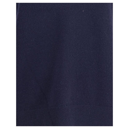 Extreme Cashmere Blue Cashmere Sleeveles Sweater showing deep ribbed hem detail for versatility and sophistication.