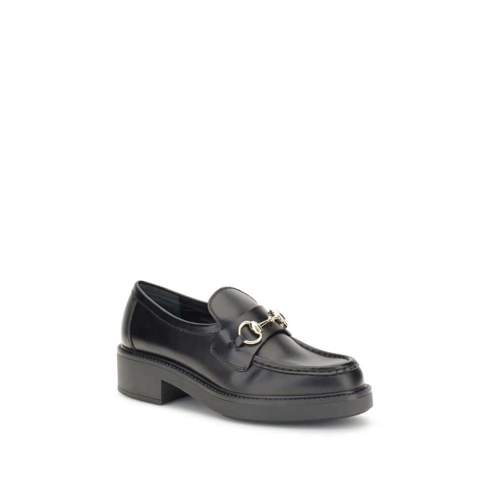 Gucci Black Calf Leather Bos Taurus Slip-On Loafers with horsebit detail, featuring a round toe and block heel for elegant style.