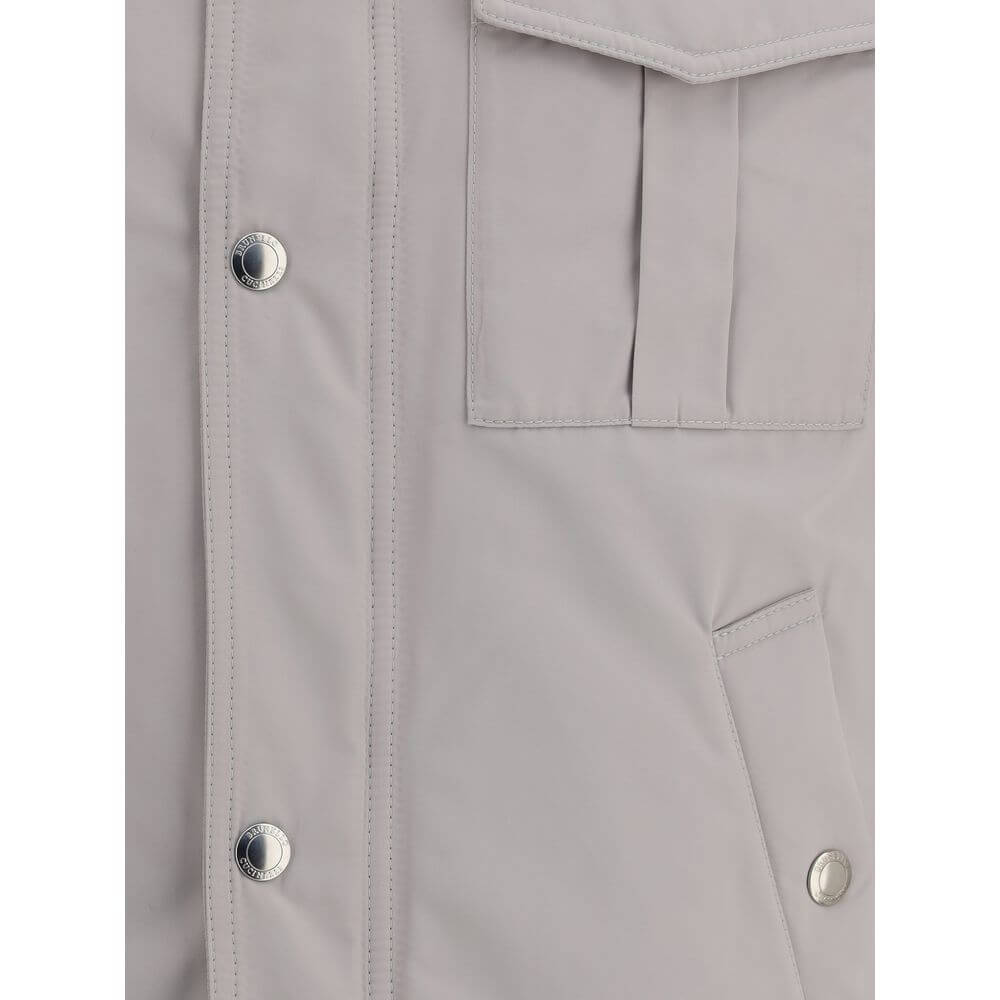Close-up of Brunello Cucinelli White Polyamide Coat highlighting button closure and pockets for style and functionality.