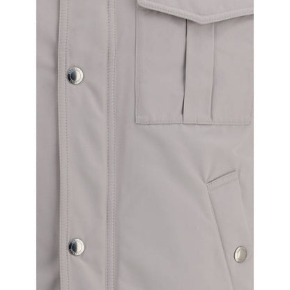 Close-up of Brunello Cucinelli White Polyamide Coat highlighting button closure and pockets for style and functionality.