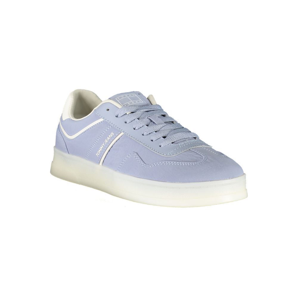 Tommy Hilfiger Blue Leather Women Sneaker with white accents, showcasing durability and comfort in a stylish design.