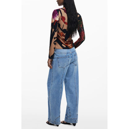 Back view of Desigual Brown Elastane Women T-Shirt with Japon Lacroix pattern, paired with wide-leg jeans.