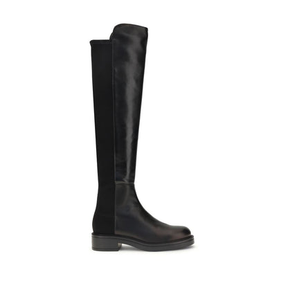 Stuart Weitzman Black Leather Over The Knee boots with block heel and elastic back for a snug fit, elegant and versatile design.