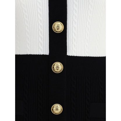 Close-up of Balmain Multicolor Viscose Casual Dress with gold embossed buttons and braided pattern detail.