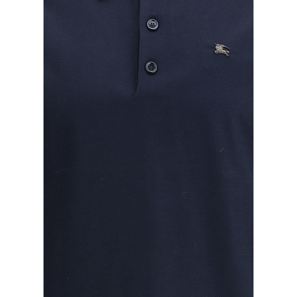 Elegant Burberry Blue Cotton Polo Shirt with metal Equestrian Knight Design and ribbed collar.