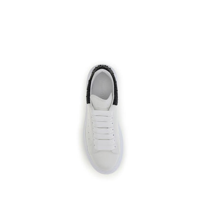 Top view of Alexander McQueen White Leather Chunky Sneakers with crystal-accented black heel and thick rubber sole.