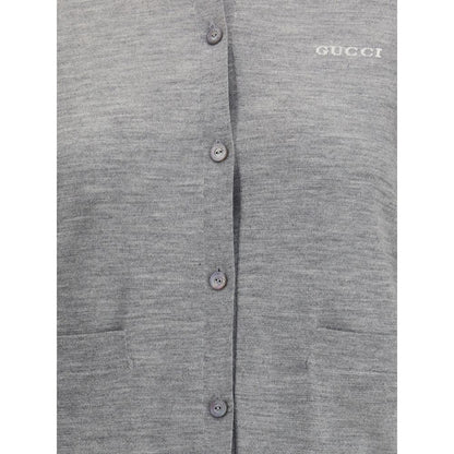 Gucci Gray Cashmere Cardigan with ribbed crew neck, buttons, patch pockets, and stitched logo, made of 70% cashmere and 30% wool.