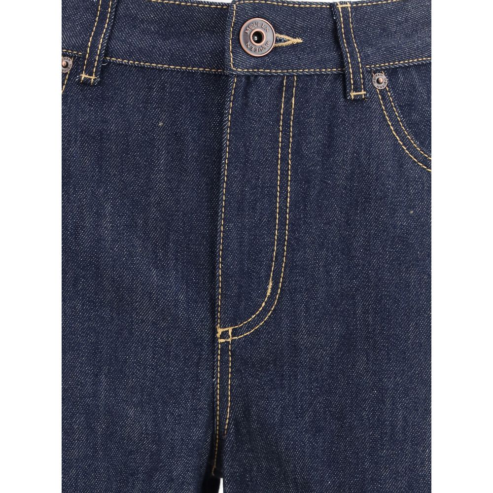 Alexander McQueen Blue Cotton Straight-Leg Jeans with contrast stitching and button closure, close-up of front design.