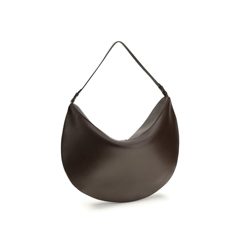 Jacquemus Brown Calf Leather Bos Taurus Shoulder Bag with slim strap and engraved snap button, AW25 collection.