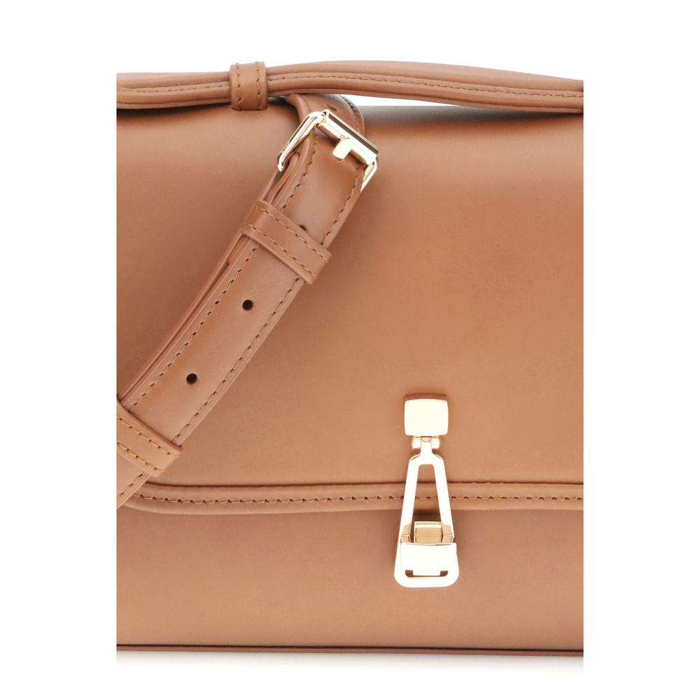 Close-up of Gabriela Hearst Brown Leather Shoulder Bag with strap and clasp details, compact and stylish satchel design.