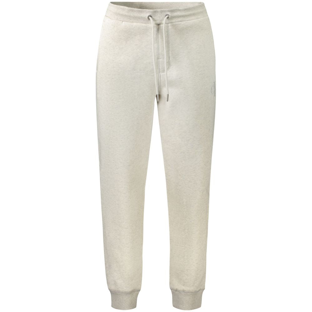 Calvin Klein Gray Cotton Pant with fleece, elastic waist, laces, and ankle cuffs, featuring embroidered logo and 20% recycled cotton.