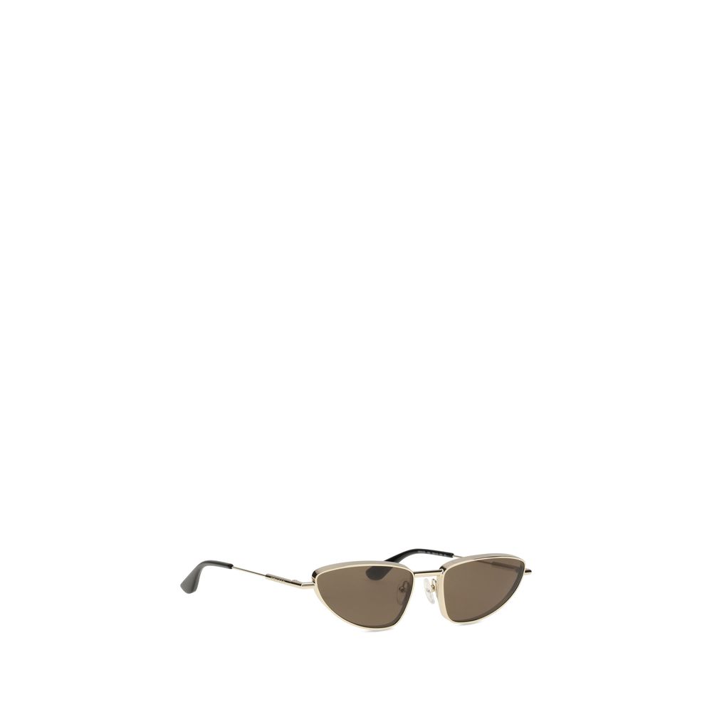 Alexander McQueen Gold Metal Sunglasses with beveled cat-eye design, silver-colored metal frame, and mirrored lenses.