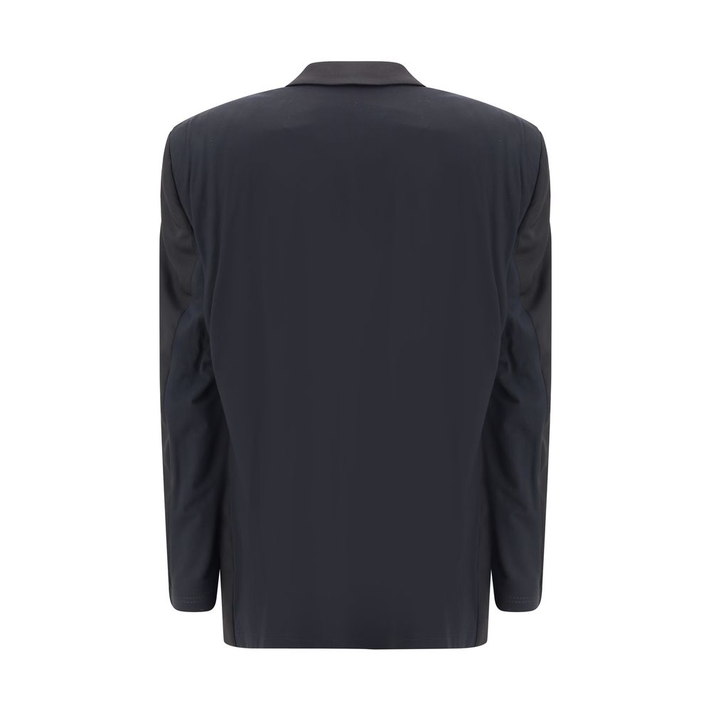 Back view of Balenciaga Black Wool Clothing blazer with extended shoulders and a modern, oversized silhouette.