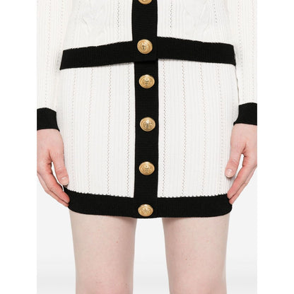 Balmain Button-embellished ribbed-knit mini skirt Skirts