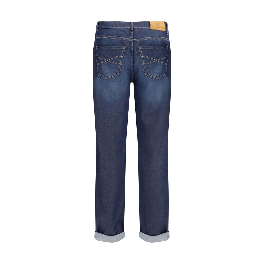 Back view of Brunello Cucinelli Blue Cotton Relaxed Fit Jeans with leather patch and turn-up hem.