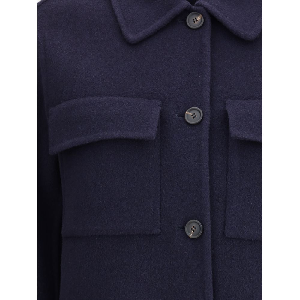 Close-up of Brunello Cucinelli Blue Fleece Wool Coat, featuring classic collar and front patch pockets.