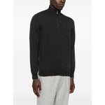 Brunello Cucinelli Cashmere sweater in grey with half zip front, long sleeves, ribbed cuffs and hem, high neck, and curved hem design.