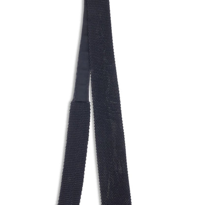 Elegant Brunello Cucinelli Knitted Tie in fine silk with unique texture, suitable for formal looks. 100% Silk. Made in Italy.
