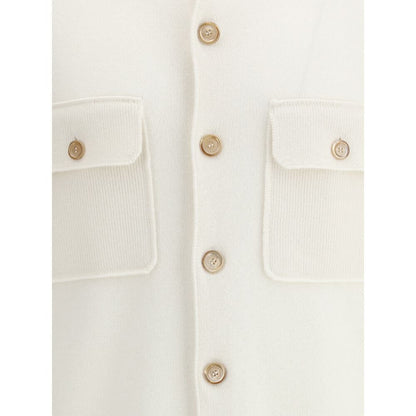 Close-up of Brunello Cucinelli White Cashmere Cardigan with buttons and pockets, featuring ribbed texture and classic design.