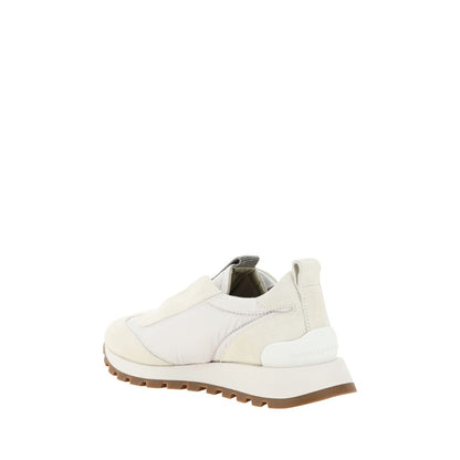 Brunello Cucinelli White Rubber Low Top Sneakers with suede details, knurled sole, and embossed heel monogram. Made in Italy.