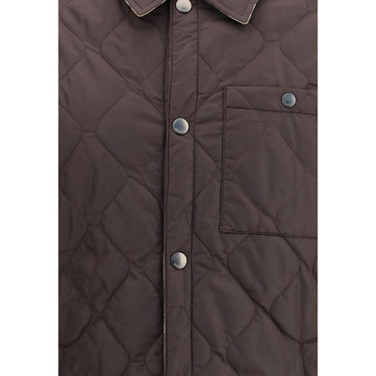 Close-up of Burberry Brown Polyamide Coat with quilted pattern, snap buttons, and a buttoned patch pocket on the chest.