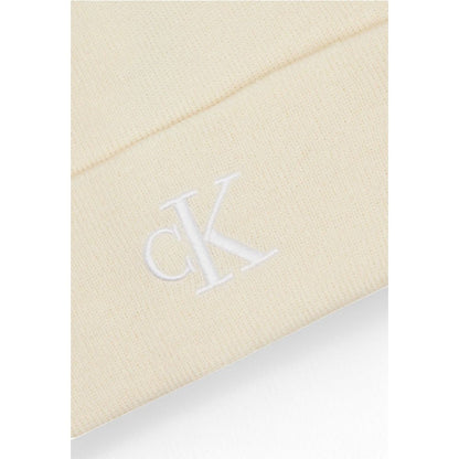 Close-up of Calvin Klein Cream Recycled Polyester Cap (Baseball Hat) showing embroidered CK monogram.