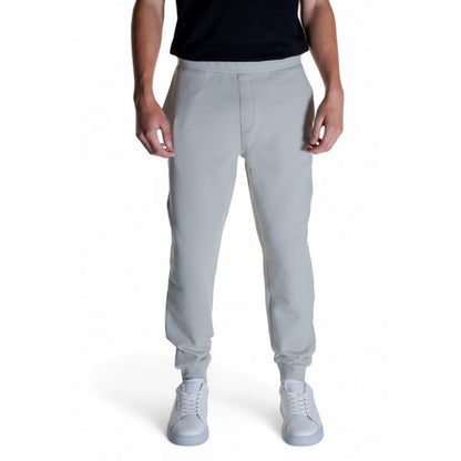 Calvin Klein Gray Cotton Joggers (Workout Pants) on model, showcasing modern design and comfort
