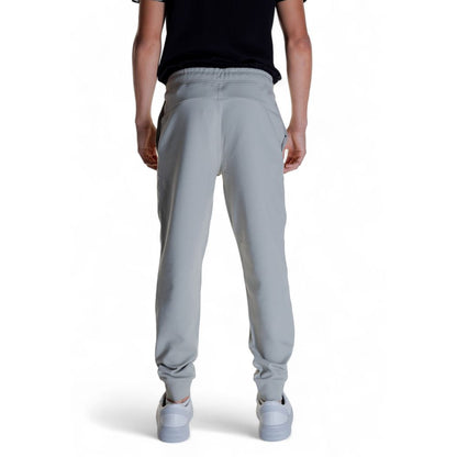 Rear view of Calvin Klein Gray Cotton Joggers (Workout Pants) in gray, perfect for leisure or workouts.