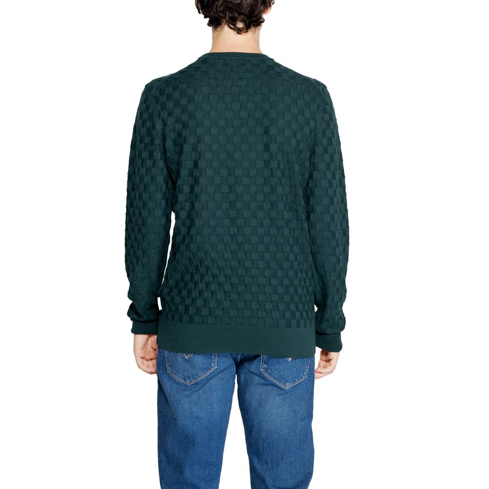 Back view of Calvin Klein Green Organic Cotton Sweatshirt with basket weave pattern, worn by a model.