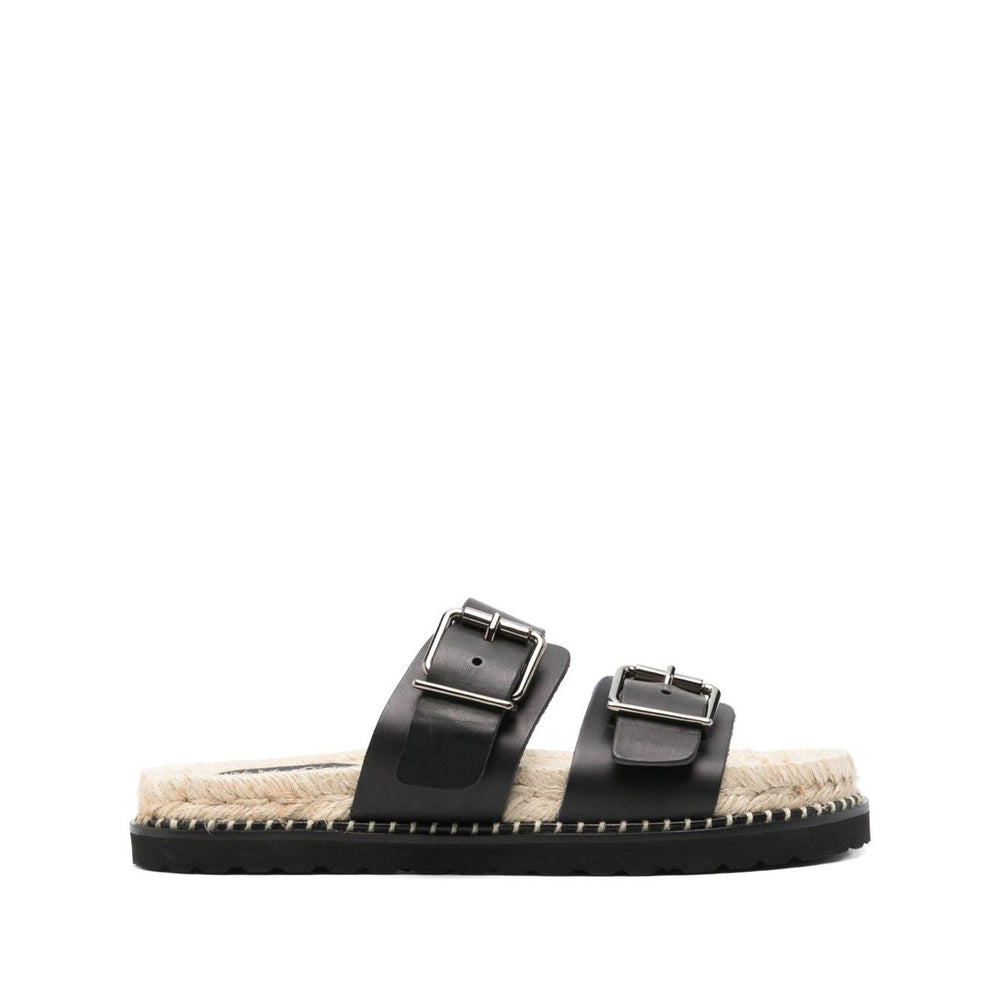 Castañer Castaner Sandals Black with double buckle, open toe, braided raffia sole, rubber outsole, 1.2 in heel. Stylish Ter leather flats.