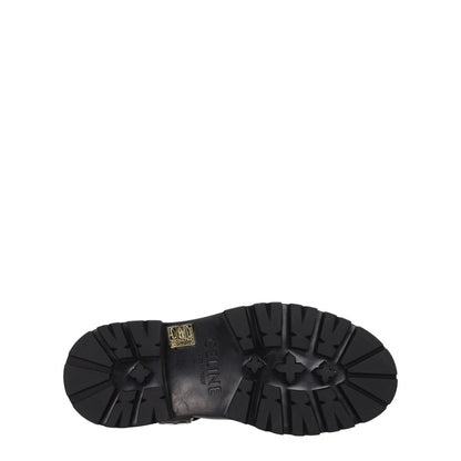 Sole view of Celine Gold Leather Ankle Boots with durable rubber sole and detailed side logo.