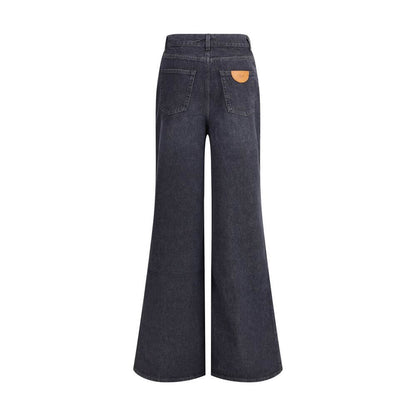 Chloé Black Cotton Flared Jeans with logo patch, mid-rise fit, and versatile design for casual outfits, made in Italy, back view.