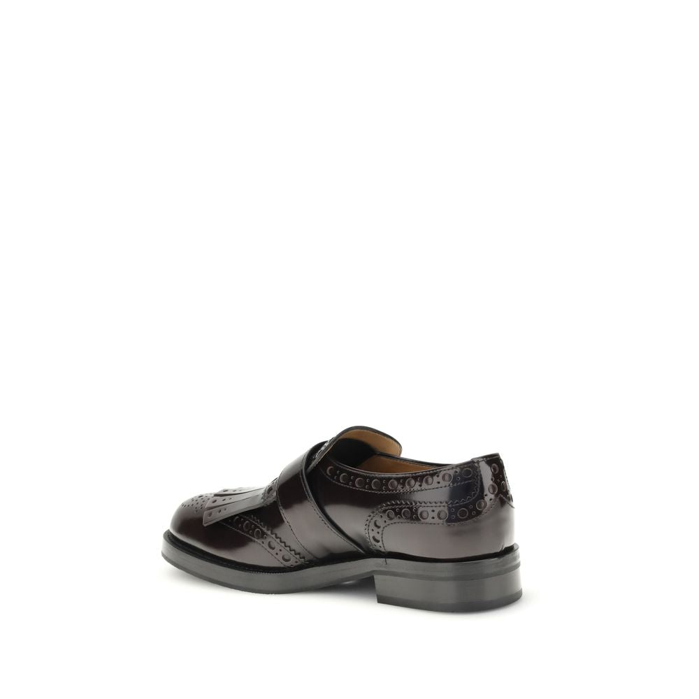 Church's Bordeaux Leather Oxfords And Derbies showing side view with buckle and fringe on patent leather, highlighting craftsmanship.