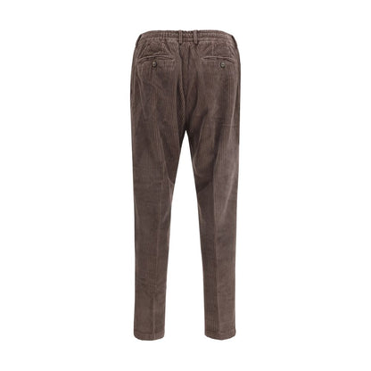 Back view of Cruna Brown Cotton Casual Pants, featuring slim fit and corduroy fabric for a refined autumn-winter look.