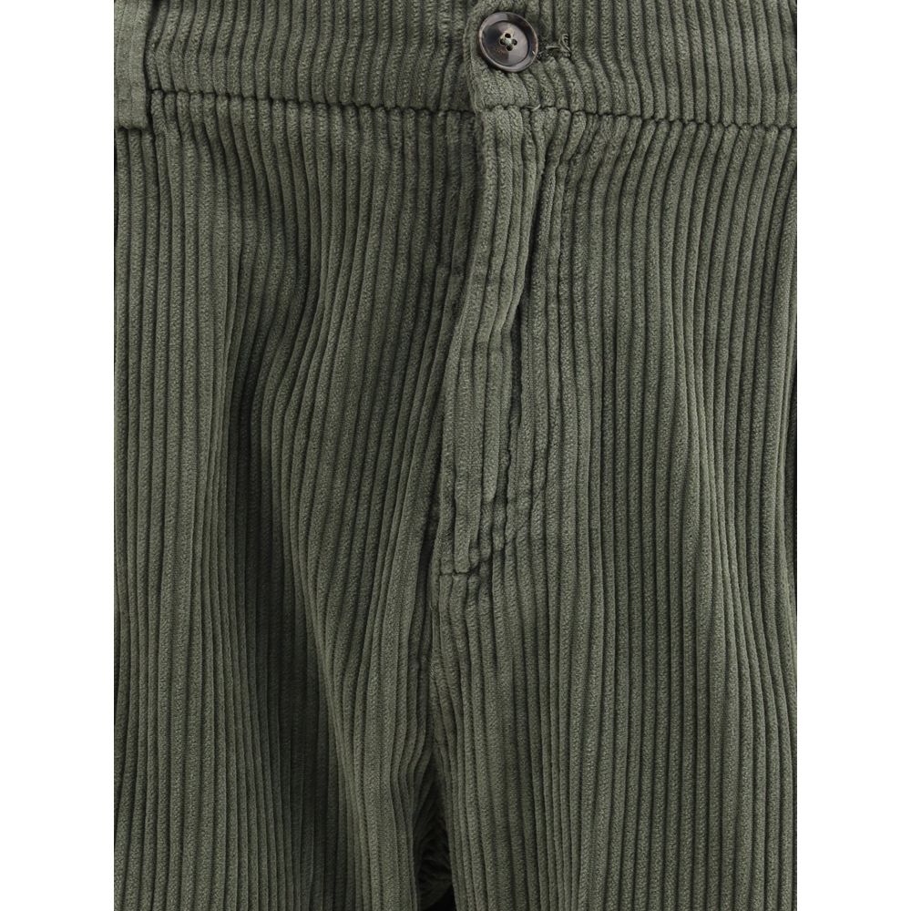 Close-up of Cruna Green Cotton Casual Pants with corduroy texture and button closure, showcasing slim fit and refined style for AW25.